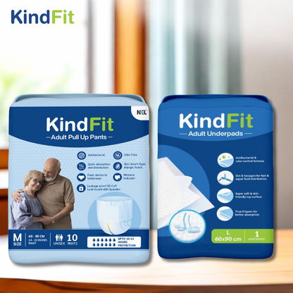 Front View Two packages of KindFit adult products on a wooden surface with a blurred background.

