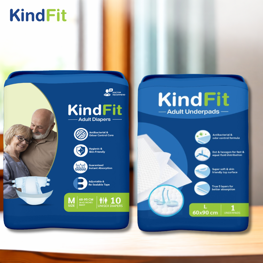 Front View Two packages of KindFit adult diapers and underpads on a wooden surface.

