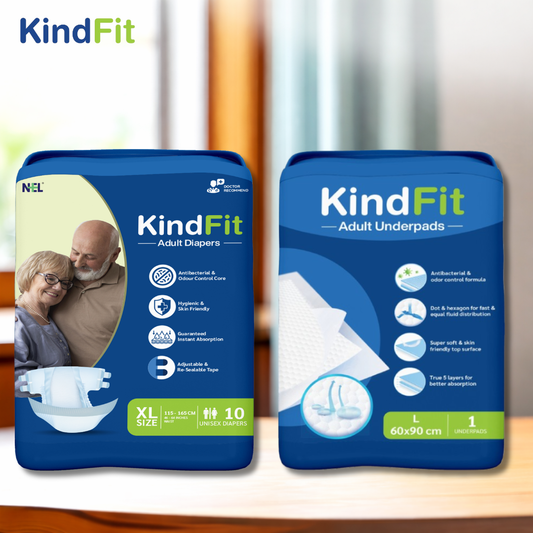 Front View Two packages of KindFit adult diapers on a wooden surface with a blurred background.

