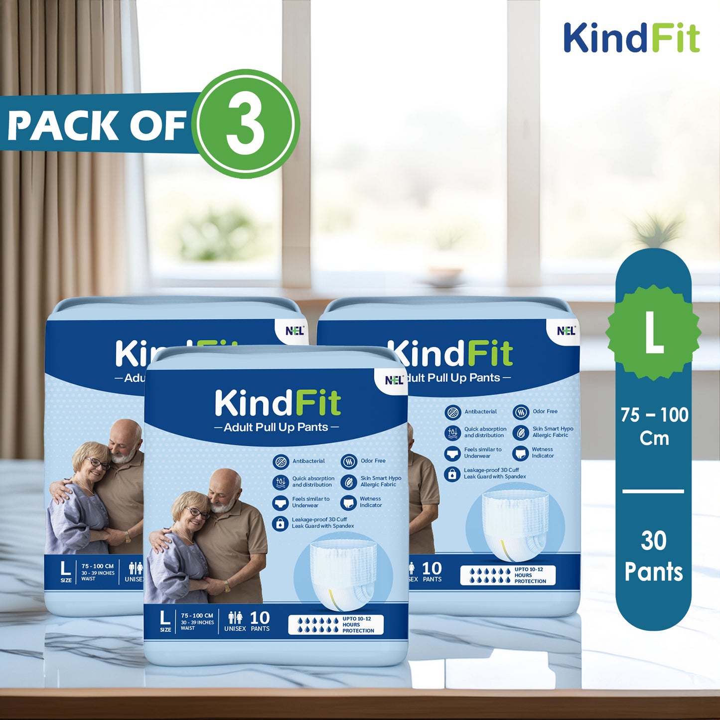 Three packs of KindFit adult pull up pants on a table with a blurred indoor background.

